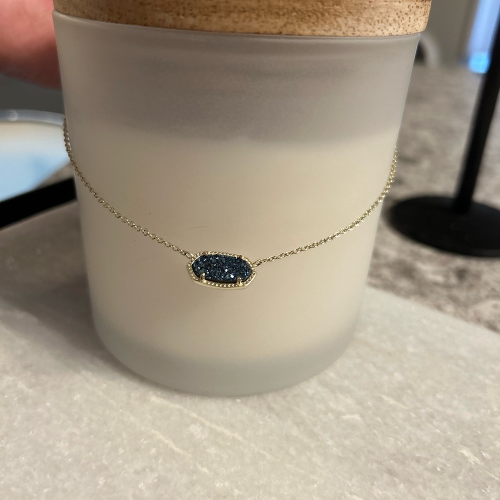 Blue stone with gold chain. Kendra Scott necklace